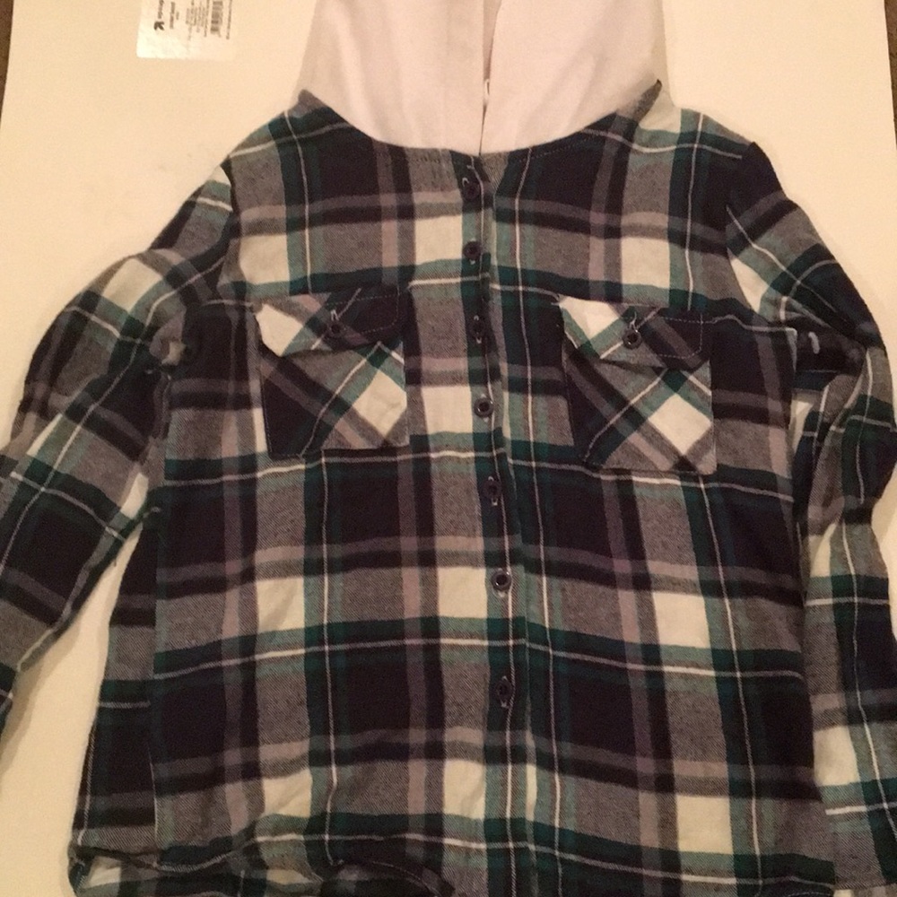 A plaid button up sweater